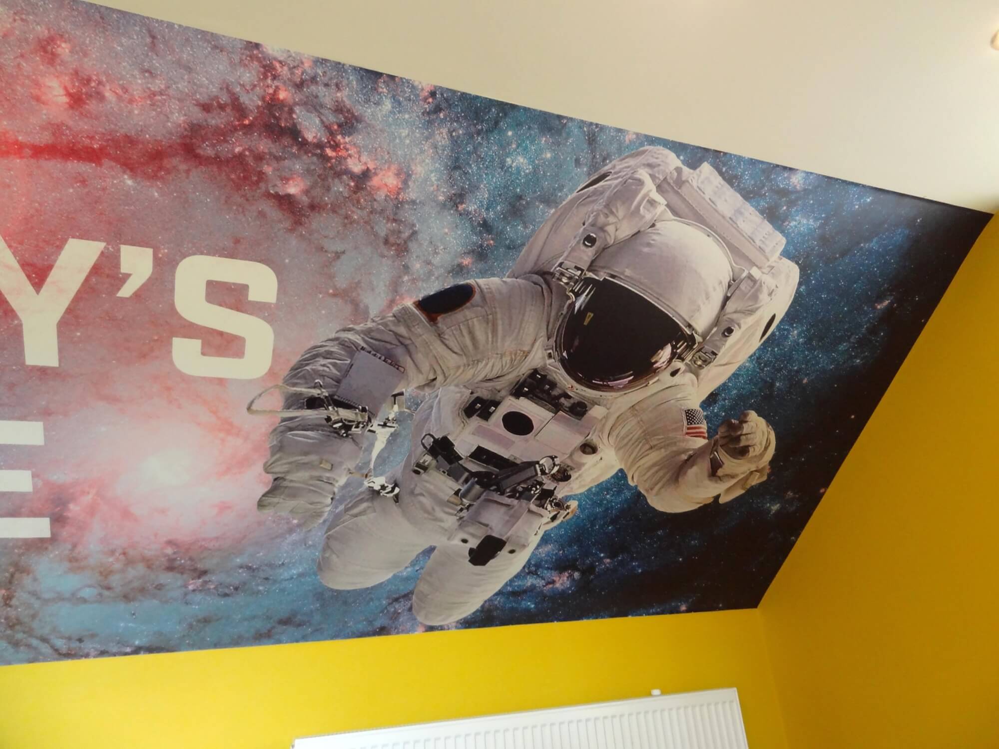Astronaut detail from Harvey's Space residential mural