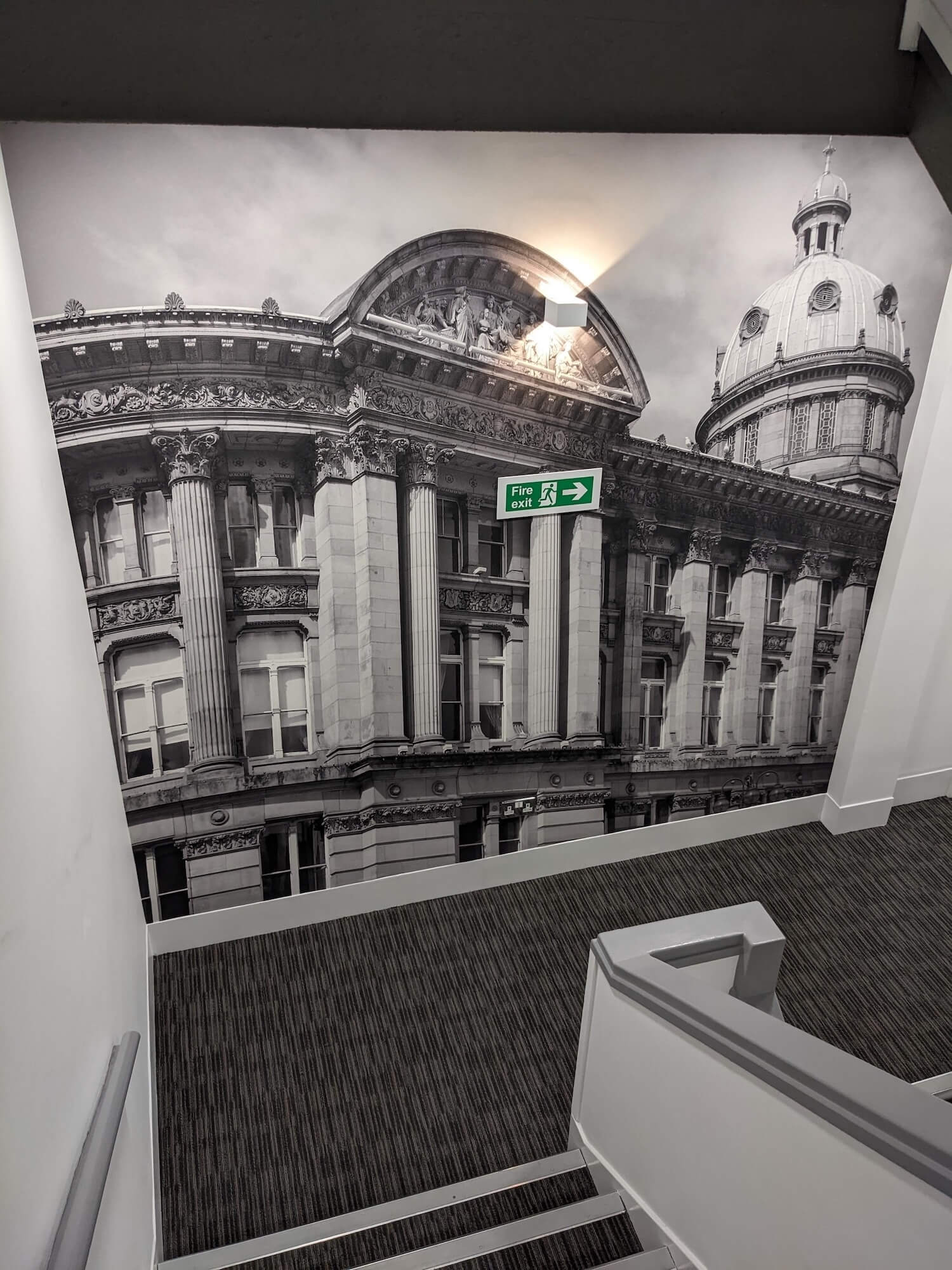 Black and white classical architecture stairwell mural